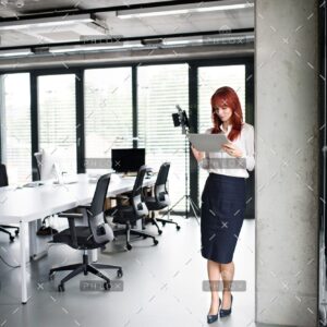 demo-attachment-32-Businesswoman-with-tablet-in-her-office-working.